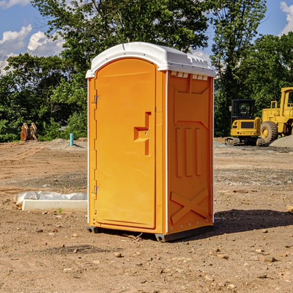 how often are the portable restrooms cleaned and serviced during a rental period in Wallace